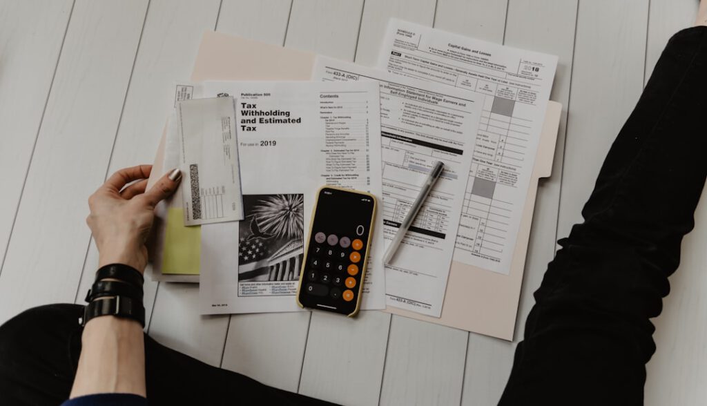 A Person Working on a tax sheet