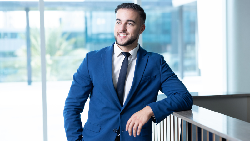 Man standing in a business suit.