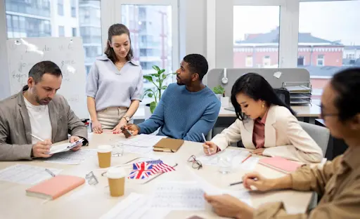 A diverse team of business professionals and legal consultants in a modern office discussing company formation documents