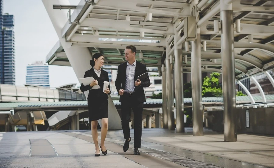 An entrepreneur consulting a corporate professional