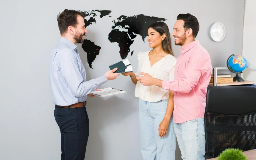 A professional guiding a couple on smartest countries to relocate