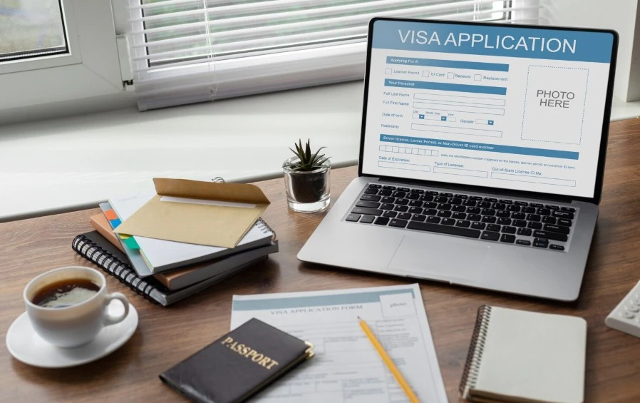 Visa application form on laptop