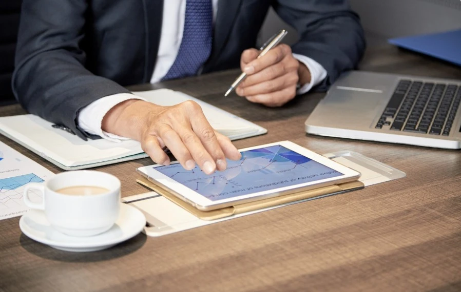 businessman using tablet at table