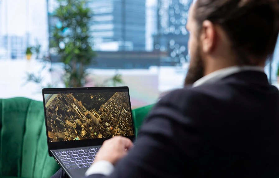businessman watching free zones in office