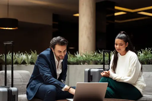 people working on a laptop